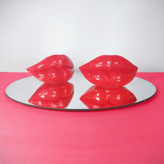 Red lip ornament on mirror